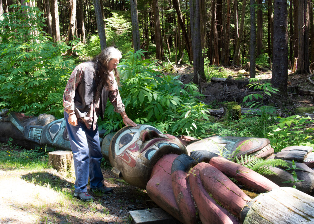 Kingsawin with Charles Brown retired Totem Pole Man with a Bear Hat.